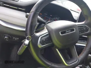 2022 Jeep Compass High Altitude z VIN 3C4NJDCB3NT145518, wystawiony jako IAAI lot #42143357 z przebiegiem 58 276 mil mil oraz . Historia ofert i sprzedaży dostępna na DreamBid. Obrazek 11.