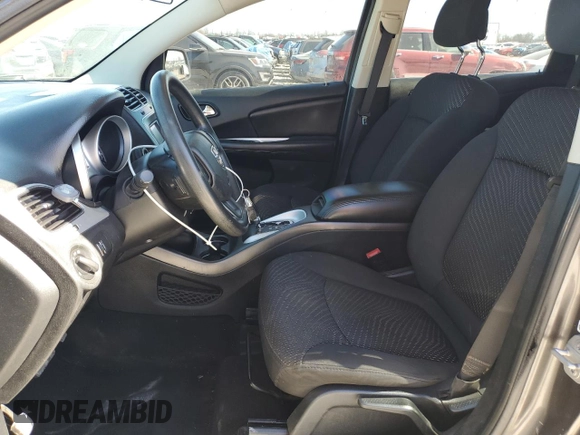 2015 Dodge Journey American Value with VIN 3C4PDCAB2FT538201, listed as a Copart auction lot 47058615 with 135,280 mi miles and Salvage Title. Bid and sale history available at DreamBid. Image 7.