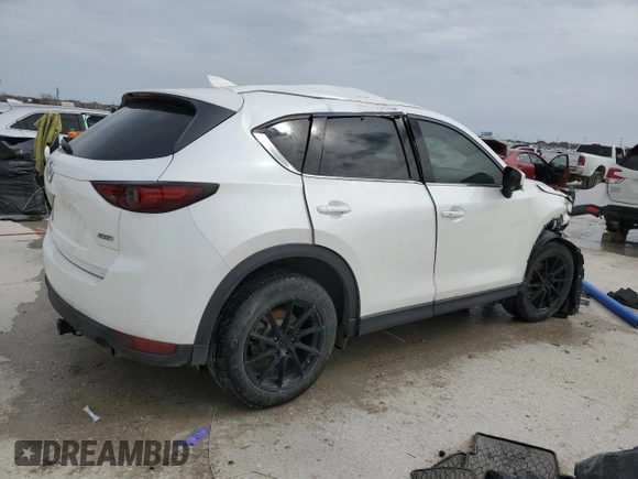 2017 Mazda CX-5 Grand Touring with VIN JM3KFBDL8H0209075, listed as a Copart auction lot 47991735 with 209,743 mi miles and Salvage Title. Bid and sale history available at carsss.com. Image 3.