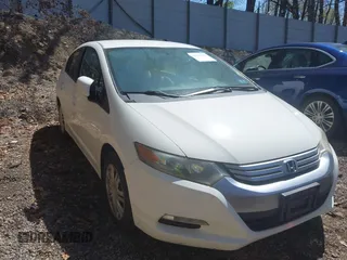2011 Honda Insight with VIN JHMZE2H30BS012285, listed as a IAAI auction lot 42145139 with 161,672 mi miles and . Bid and sale history available at DreamBid. Image 14.