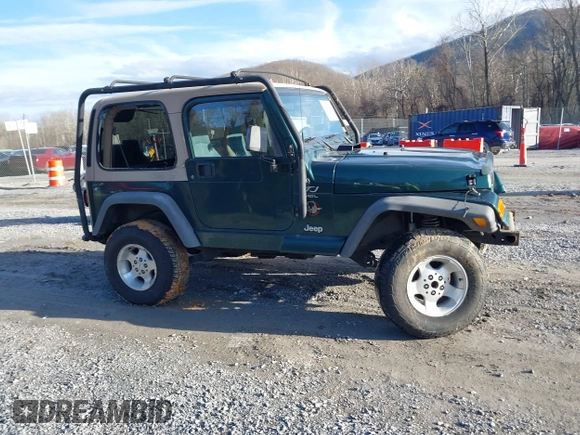 2000 Jeep Wrangler Sahara with VIN 1J4FA59S0YP724521, listed as a IAAI auction lot 41574689 with 167,584 mi miles. Bid and sale history available at carsss.com. Image 13.