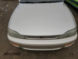 1995 Toyota Camry LE z VIN 4T1SK12EXSU529058, wystawiony jako Copart lot #49055255 z przebiegiem 166 029 mil mil oraz Szkoda całkowita • Salvage title. Historia ofert i sprzedaży dostępna na DreamBid. Obrazek 11.