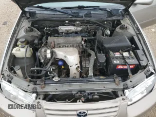 2001 Toyota Camry CE z VIN 4T1BG22K01U057836, wystawiony jako Copart lot #57046325 z przebiegiem 151 882 mil mil oraz Szkoda całkowita • Salvage title. Historia ofert i sprzedaży dostępna na DreamBid. Obrazek 11.