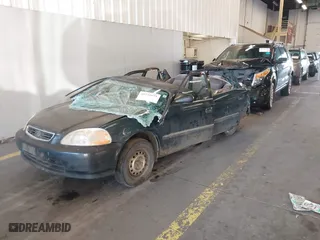 1996 Honda Civic DX with VIN 1HGEJ6625TL019386, listed as a IAAI auction lot 40775179 with 212,267 mi miles. Bid and sale history available at carsss.com. Image 2.