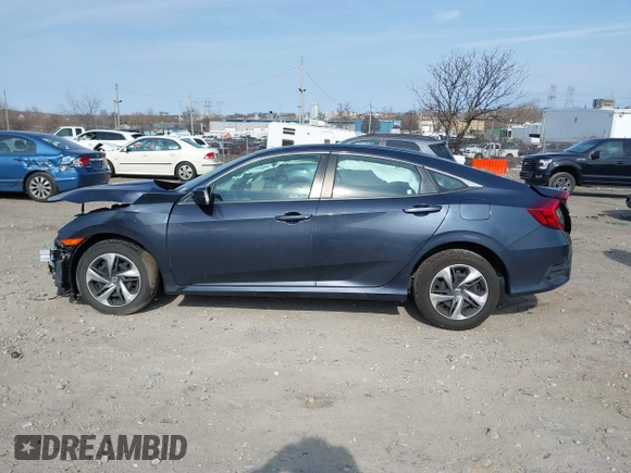 2020 Honda Civic LX z VIN 2HGFC2F61LH570034, wystawiony jako IAAI lot #41784357 z przebiegiem Nie podano mil oraz . Historia ofert i sprzedaży dostępna na DreamBid. Obrazek 13.