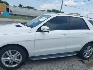 2015 Mercedes-Benz M 350 with VIN 4JGDA5JB0FA452749, listed as a IAAI auction lot 42412440 with 88,304 mi miles and . Bid and sale history available at DreamBid. Image 14.