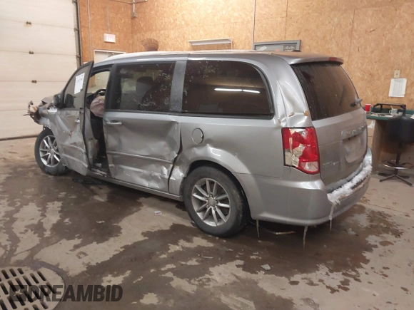 2015 Dodge Grand Caravan SE with VIN 2C4RDGBG1FR738659, listed as a IAAI auction lot 41547350 with 96,621 mi miles and . Bid and sale history available at DreamBid. Image 3.