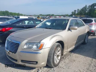 2012 Chrysler 300 with VIN 2C3CCAAG8CH261449, listed as a IAAI auction lot 42126170 with 189,961 mi miles and . Bid and sale history available at DreamBid. Image 2.