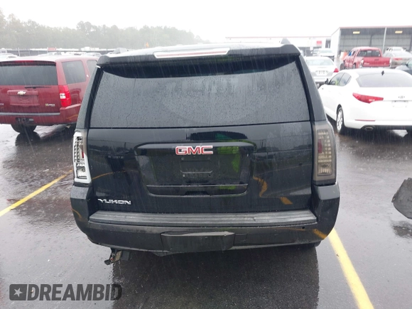 2016 GMC Yukon SLT with VIN 1GKS1BKC8GR217962, listed as a IAAI auction lot 40422726 with 182,293 mi miles. Bid and sale history available at carsss.com. Image 17.