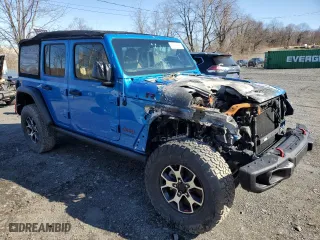 2022 Jeep Wrangler Unlimited Rubicon with VIN 1C4JJXFM7NW237044, listed as a Copart auction lot 51639825 with 0 mi miles and Salvage Title. Bid and sale history available at carsss.com. Image 4.