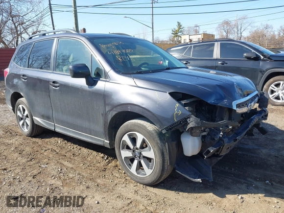 2018 Subaru Forester Premium with VIN JF2SJAEC9JH411903, listed as a IAAI auction lot 41844000 with 91,090 mi miles and . Bid and sale history available at DreamBid. Image 1.