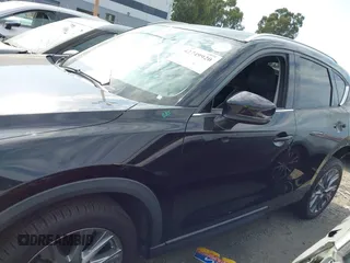 2020 Mazda CX-5 Grand Touring with VIN JM3KFADM3L1819939, listed as a IAAI auction lot 42749920 with 35,407 mi miles and . Bid and sale history available at DreamBid. Image 15.