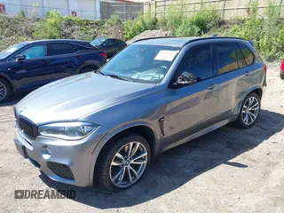 2014 BMW X5 xDrive50i with VIN 5UXKR6C57E0J72301, listed as a IAAI auction lot 39379887 with 117,012 mi miles. Bid and sale history available at carsss.com. Image 17.