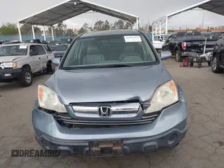 2009 Honda CR-V EX-L with VIN JHLRE38759C002661, listed as a IAAI auction lot 41956424 with 162,685 mi miles and . Bid and sale history available at carsss.com. Image 12.