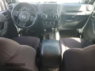 2013 Jeep Wrangler Unlimited Sport z VIN 1C4BJWDG0DL690966, wystawiony jako Copart lot #50554615 z przebiegiem 101 383 mil mil oraz Szkoda całkowita • Salvage title. Historia ofert i sprzedaży dostępna na DreamBid. Obrazek 8.