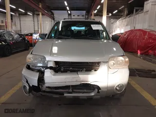 2006 Ford Escape Limited with VIN 1FMCU94116KA13194, listed as a IAAI auction lot 41276569 with 237,273 mi miles. Bid and sale history available at carsss.com. Image 12.