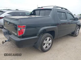 2013 Honda Ridgeline RTL with VIN 5FPYK1F56DB003473, listed as a IAAI auction lot 42101963 with 170,375 mi miles and . Bid and sale history available at DreamBid. Image 4.