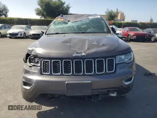 2018 Jeep Grand Cherokee Limited with VIN 1C4RJEBG5JC301438, listed as a Copart auction lot 61646835 with 66,568 mi miles and Salvage title. Bid and sale history available at DreamBid. Image 5.
