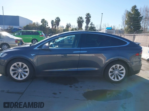 2016 Tesla Model X 70D with VIN 5YJXCBE24GF019450, listed as a IAAI auction lot 41517321 with 96,831 mi miles. Bid and sale history available at carsss.com. Image 14.