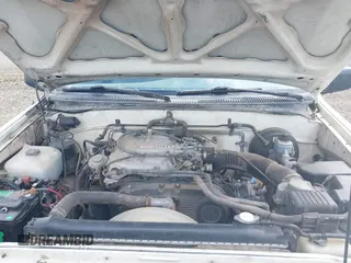 1993 Toyota T100 z VIN JT4VD20C1P0010434, wystawiony jako IAAI lot #42270410 z przebiegiem 263 632 mil mil oraz . Historia ofert i sprzedaży dostępna na DreamBid. Obrazek 10.