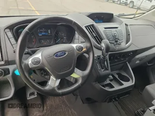 2019 Ford Transit z VIN 1FTYR1YG1KKB48262, wystawiony jako IAAI lot #42512751 z przebiegiem 146 896 mil mil oraz . Historia ofert i sprzedaży dostępna na DreamBid. Obrazek 1.