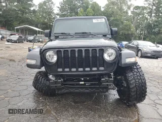 2023 Jeep Wrangler Sport with VIN 1C4HJXDN9PW638737, listed as a Copart auction lot 71367284 with 12,054 mi miles and Salvage Title. Bid and sale history available at DreamBid. Image 5.