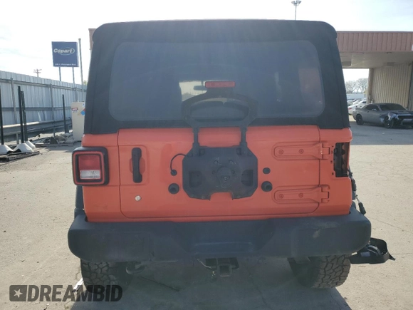 2019 Jeep Wrangler Unlimited Sport S with VIN 1C4HJXDGXKW557241, listed as a Copart auction lot 52485164 with 59,798 mi miles and Salvage title. Bid and sale history available at DreamBid. Image 6.