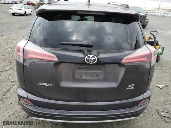 2016 Toyota RAV4 SE with VIN JTMJFREV9GJ088756, listed as a Copart auction lot 69210994 with 0 mi miles and Salvage Title. Bid and sale history available at carsss.com. Image 6.