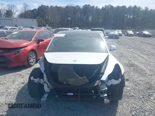 2022 Tesla Model 3 Long Range with VIN 5YJ3E1EB0NF106570, listed as a IAAI auction lot 41832622 with 52,679 mi miles and . Bid and sale history available at DreamBid. Image 12.