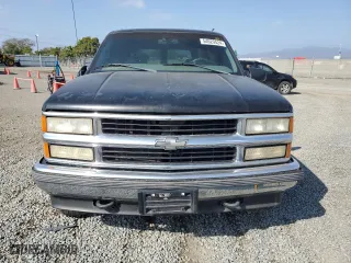 1999 Chevrolet Tahoe Z71 with VIN 1GNEK13R5XJ308924, listed as a Copart auction lot 64463984 with 229,181 mi miles and Salvage Title. Bid and sale history available at carsss.com. Image 5.