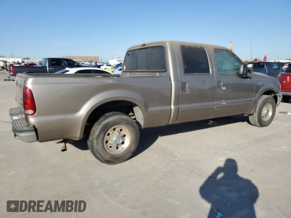 2002 Ford F-250 XL with VIN 1FTNW20S12EA04551, listed as a Copart auction lot 82785534 with 375,165 mi miles and Clean Title. Bid and sale history available at DreamBid. Image 3.