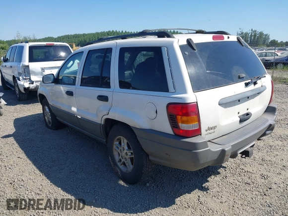 2002 Jeep Grand Cherokee Laredo with VIN 1J4GW48SX2C247709, listed as a IAAI auction lot 42444030 with 196,591 mi miles and . Bid and sale history available at DreamBid. Image 3.