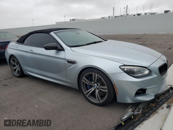 2014 BMW M6 z VIN WBSLZ9C56EDZ78719, wystawiony jako Copart lot #42445545 z przebiegiem 63 691 mil mil oraz Szkoda całkowita • Salvage title. Historia ofert i sprzedaży dostępna na DreamBid. Obrazek 4.