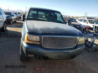 2000 GMC Denali z VIN 1GKEK13R5YR162198, wystawiony jako Copart lot #80325964 z przebiegiem 228 043 mil mil oraz Szkody całkowita. Historia ofert i sprzedaży dostępna na DreamBid. Obrazek 5.