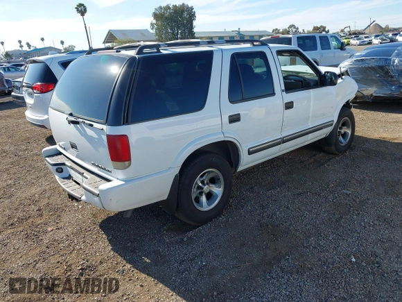 2001 Chevrolet Blazer LT z VIN 1GNCS13W712122865, wystawiony jako IAAI lot #41997035 z przebiegiem 161 862 mil mil oraz . Historia ofert i sprzedaży dostępna na DreamBid. Obrazek 4.