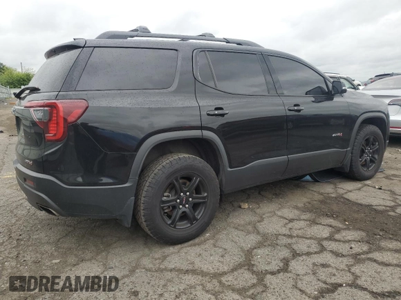 2021 GMC Acadia AT4 with VIN 1GKKNLLS5MZ168635, listed as a Copart auction lot 55988445 with 106,777 mi miles and Salvage title. Bid and sale history available at DreamBid. Image 3.