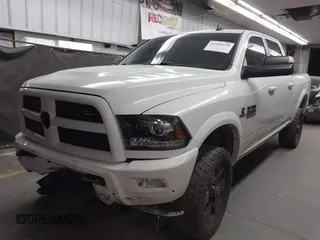 2017 Ram 2500 Laramie with VIN 3C6UR5FL1HG726325, listed as a IAAI auction lot 42315570 with 104,038 mi miles and . Bid and sale history available at DreamBid. Image 2.