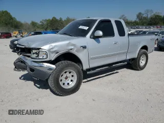 2000 Ford F-150 XL with VIN 1FTRX18L8YNB58706, listed as a Copart auction lot 53243215 with 0 mi miles and Salvage Title. Bid and sale history available at carsss.com. Image 1.