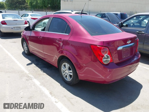2014 Chevrolet Sonic LT with VIN 1G1JC5SH7E4121869, listed as a IAAI auction lot 42204925 with 122,394 mi miles and . Bid and sale history available at DreamBid. Image 3.
