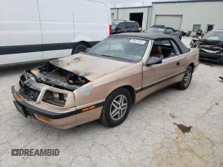 1988 Chrysler LeBaron z VIN 1C3XJ45K9JG438476, wystawiony jako Copart lot #55567334 z przebiegiem 213 424 mil mil oraz Szkody całkowita. Historia ofert i sprzedaży dostępna na DreamBid. Obrazek 1.