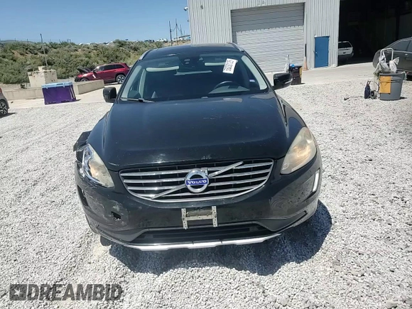 2015 Volvo XC60 T5 z VIN YV4612RK7F2716797, wystawiony jako Copart lot #58010425 z przebiegiem 49 647 mil mil oraz Szkoda całkowita • Salvage title. Historia ofert i sprzedaży dostępna na DreamBid. Obrazek 14.