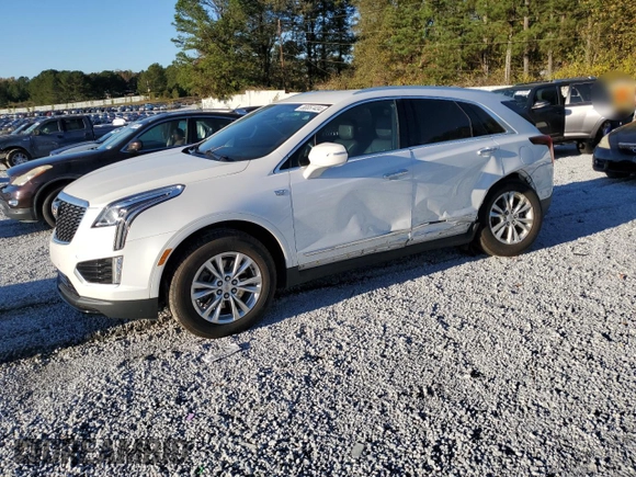2021 Cadillac XT5 FWD Luxury with VIN 1GYKNAR46MZ171465, listed as a Copart auction lot 80857434 with 58,739 mi miles and Salvage Title. Bid and sale history available at carsss.com. Image 1.