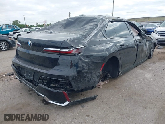 2023 BMW 7 Series 740i with VIN WBA23EH05PCM58771, listed as a IAAI auction lot 42024556 with Not provided miles and . Bid and sale history available at DreamBid. Image 4.
