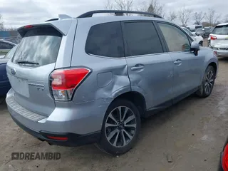 2018 Subaru Forester Premium with VIN JF2SJGEC7JH410509, listed as a IAAI auction lot 41803775 with 137,057 mi miles. Bid and sale history available at carsss.com. Image 4.