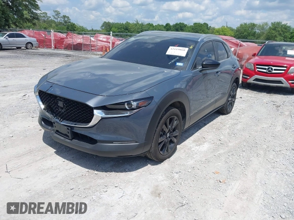 2024 Mazda CX-30 S Preferred with VIN 3MVDMBCM5RM648894, listed as a IAAI auction lot 42119860 with 23,857 mi miles and . Bid and sale history available at DreamBid. Image 2.