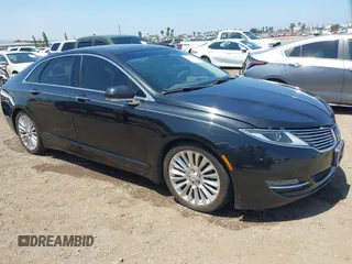 2014 Lincoln MKZ z VIN 3LN6L2JK1ER821351, wystawiony jako IAAI lot #42310647 z przebiegiem 118 106 mil mil oraz . Historia ofert i sprzedaży dostępna na DreamBid. Obrazek 1.