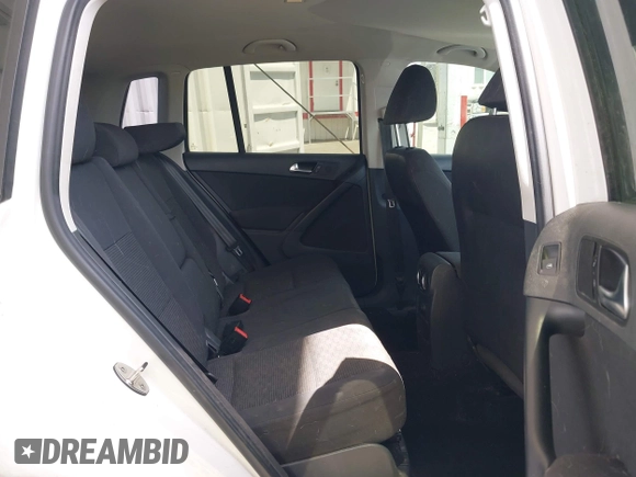 2014 Volkswagen Tiguan SEL with VIN WVGAV3AX0EW524669, listed as a IAAI auction lot 42289003 with 94,513 mi miles and . Bid and sale history available at DreamBid. Image 8.