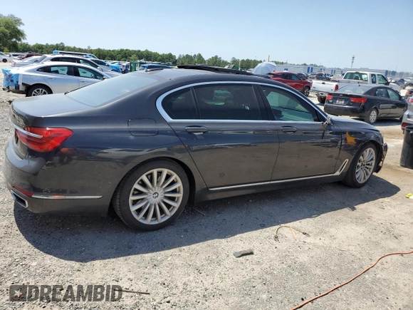2017 BMW 7 Series 740i z VIN WBA7E2C30HG741105, wystawiony jako Copart lot #56632005 z przebiegiem 95 162 mil mil oraz Czysty tytuł • Clean title. Historia ofert i sprzedaży dostępna na DreamBid. Obrazek 3.