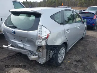 2013 Toyota Prius Two with VIN JTDZN3EU5D3255365, listed as a IAAI auction lot 41724204 with 122,264 mi miles and . Bid and sale history available at DreamBid. Image 4.