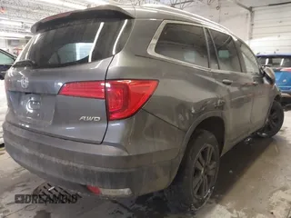 2016 Honda Pilot EX-L with VIN 5FNYF6H75GB104064, listed as a IAAI auction lot 41286959 with 106,263 mi miles. Bid and sale history available at carsss.com. Image 4.